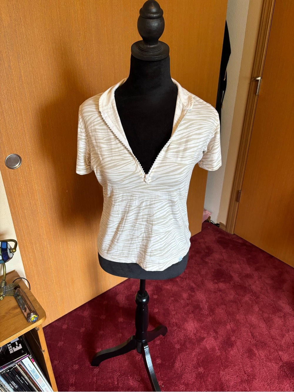 Women’s Cream Zebra-Stripe Zip V-Neck Top